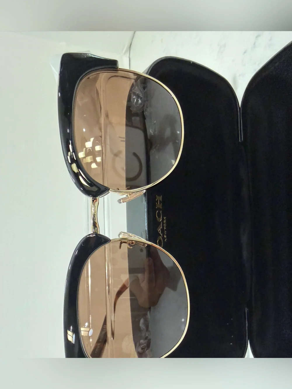 Coach Black Frame Sunglasses with Gold Trim and Brown Lenses